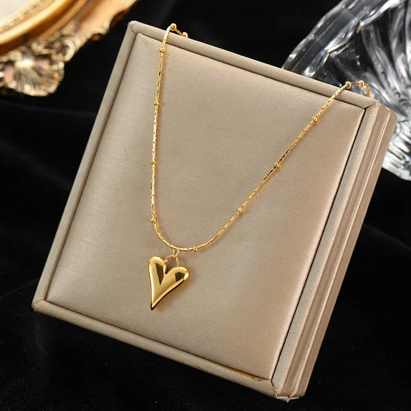 Trendy Stainless Steel Ball Pendant Necklace for Women - Piña Colada