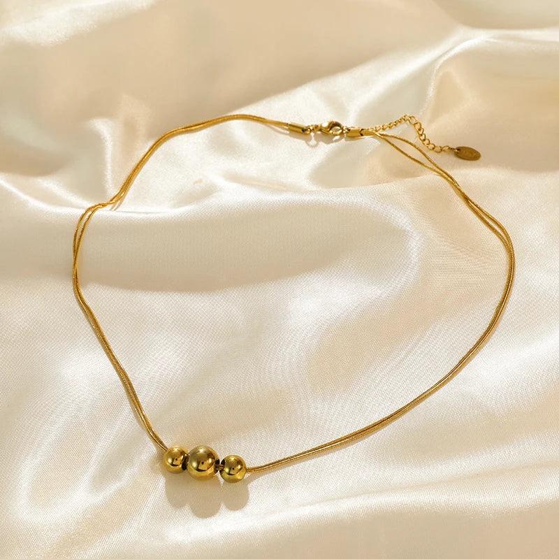 Trendy Stainless Steel Ball Pendant Necklace for Women - Piña Colada