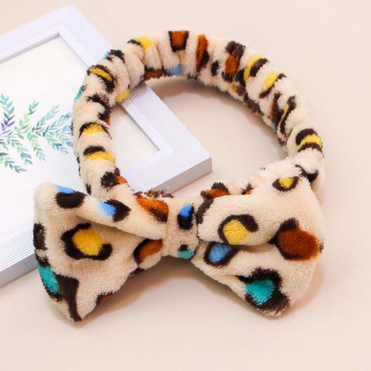 Leopard Bow Coral Fleece Spa Headband - Piña Colada