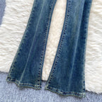 High-Waisted Flared Denim Pants with Faux Zippers – Streetwear Style - Piña Colada