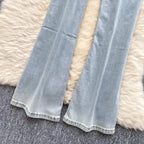High-Waisted Flared Denim Pants with Faux Zippers – Streetwear Style - Piña Colada