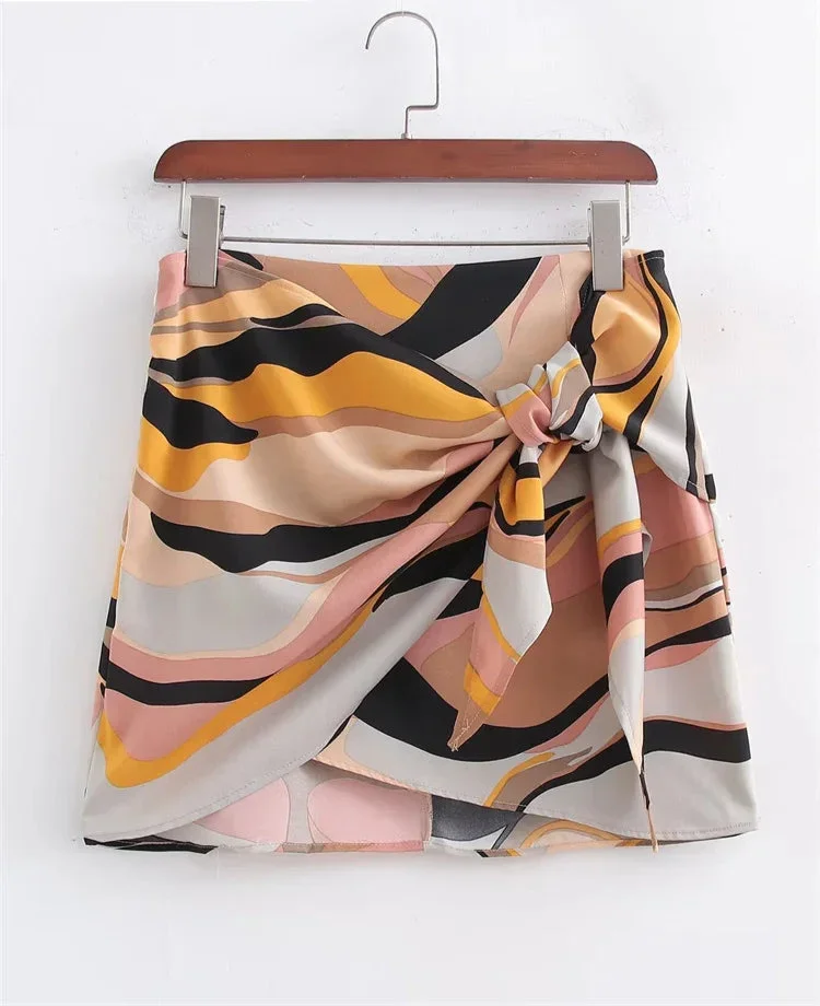 Fashion Graffiti Print Bow Ted Wrapped Mini Skirt - Piña Colada