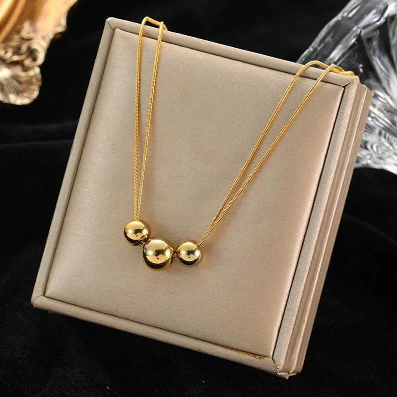 Trendy Stainless Steel Ball Pendant Necklace for Women - Piña Colada