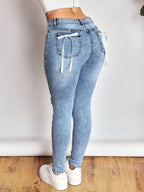 Distressed Skinny Jeans with Bow Back - Piña Colada
