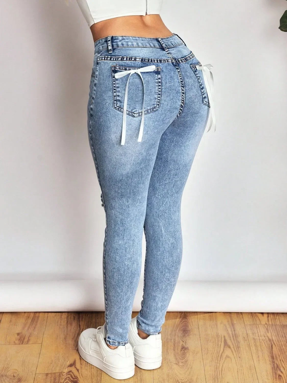 Distressed Skinny Jeans with Bow Back - Piña Colada